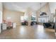 Spacious living area with tile floors and a high ceiling, offering a versatile space for relaxing and entertaining at 4209 Glass Lantern Dr, North Las Vegas, NV 89032