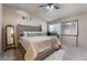 Comfortable main bedroom features vaulted ceiling, plush carpet, and large windows at 4209 Glass Lantern Dr, North Las Vegas, NV 89032