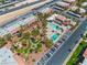 Community aerial shot showcases pools, landscaping, parking, and well-maintained building exteriors at 4400 Sandy River Dr # 4, Las Vegas, NV 89103
