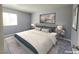 Empty living room features neutral tones, sliding glass doors and a carpeted floor at 4400 Sandy River Dr # 4, Las Vegas, NV 89103