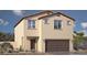 Charming two-story home featuring a two-car garage, desert landscaping, and neutral earth tone color palette at 4434 Bayley Skye Ave # 179, Las Vegas, NV 89141