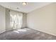 Comfortable bedroom showcasing ample natural light and neutral decor at 4503 Meteora Ledge Ave, North Las Vegas, NV 89084
