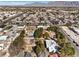 Aerial view of the property with mountain views and surrounding neighborhood at 5715 Gilbert Ln, Las Vegas, NV 89130