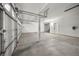 Spacious garage with high ceilings and ample room for storage and work space at 575 Dusty Palms Ln, Henderson, NV 89052