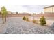 Wide angle view of the expansive backyard with potential for customization and landscaping at 5865 Alice Landing Ct, Las Vegas, NV 89149
