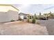 Spacious, expansive backyard with desert landscaping, pavers, and room for entertaining at 5865 Alice Landing Ct, Las Vegas, NV 89149