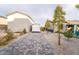 Long driveway between two houses with pavers, desert landscaping and room to park your vehicles at 5865 Alice Landing Ct, Las Vegas, NV 89149