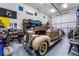 Clean, organized garage featuring a vintage car and ample storage space at 5865 Alice Landing Ct, Las Vegas, NV 89149