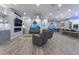 Spacious living room area with a fireplace, recessed lighting, and gray couches at 5865 Alice Landing Ct, Las Vegas, NV 89149