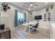 Bright office space with dual desks, ample storage, and natural light with modern furnishings at 5865 Alice Landing Ct, Las Vegas, NV 89149