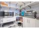 Well-organized pantry featuring white shelves and cabinets to store various appliances and goods at 5865 Alice Landing Ct, Las Vegas, NV 89149