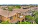 Aerial view of the home's backyard with a patio and desert landscaping at 617 Apricot Rose Pl, Las Vegas, NV 89138