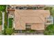 Aerial view of a home showing the tile roof, landscaping, and outdoor living areas at 617 Apricot Rose Pl, Las Vegas, NV 89138