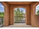 Charming balcony with an arched entryway provides a scenic outdoor view and a cozy retreat at 617 Apricot Rose Pl, Las Vegas, NV 89138