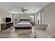 Spacious bedroom features a ceiling fan, balcony access, and natural light for a serene retreat at 617 Apricot Rose Pl, Las Vegas, NV 89138