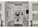 Bright office with white desk and shelving, complemented by recessed lighting and an overhead fan at 617 Apricot Rose Pl, Las Vegas, NV 89138