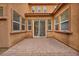 Private outdoor patio featuring brick flooring, offering a perfect space for relaxation and entertaining at 617 Apricot Rose Pl, Las Vegas, NV 89138