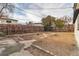 Fenced backyard featuring a circular brick feature at 617 Stanford St, Las Vegas, NV 89107