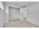 This bedroom has an open closet and is freshly painted with new carpet at 617 Stanford St, Las Vegas, NV 89107