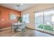 Bright dining area with sliding glass doors to a patio, ideal for indoor-outdoor living at 6525 Cinnamon Hazelnut St # Lot 92, North Las Vegas, NV 89084