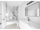 Stylish bathroom with marble-look shower, modern fixtures, and patterned tile flooring at 700 Carnegie St # 3913, Henderson, NV 89052