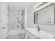 Modern bathroom with patterned shower, sleek vanity, and stylish fixtures at 700 Carnegie St # 3913, Henderson, NV 89052