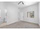 Light-filled bedroom with adjoining bathroom and natural light from a side window at 700 Carnegie St # 3913, Henderson, NV 89052