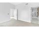 Neutral bedroom with carpet, views to an ensuite bathroom, and ample natural light at 700 Carnegie St # 3913, Henderson, NV 89052