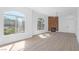 Spacious living room with plenty of natural light and a contemporary fireplace feature wall at 700 Carnegie St # 3913, Henderson, NV 89052