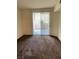 Bedroom with a sliding glass door to an outdoor balcony at 7131 S Durango Dr # 104, Las Vegas, NV 89113