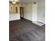 Open-concept living room with view into the kitchen at 7131 S Durango Dr # 104, Las Vegas, NV 89113