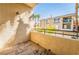 Private balcony with tile flooring and views of the surrounding community at 7189 S Durango Dr # 203, Las Vegas, NV 89113