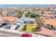 Wide aerial view of a home showing the yard, driveway, and surrounding neighborhood at 729 Scottsdale St, Henderson, NV 89002