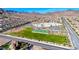 Aerial view of the school campus with sports fields surrounded by a residential neighborhood at 729 Scottsdale St, Henderson, NV 89002