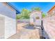 Backyard with shed, block fencing and view of neighbor's trees at 729 Scottsdale St, Henderson, NV 89002