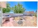 Backyard featuring a grill and brick-paved patio area at 729 Scottsdale St, Henderson, NV 89002
