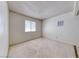 Bedroom features a neutral carpet, single window and a ceiling light at 729 Scottsdale St, Henderson, NV 89002