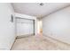 Bedroom featuring neutral carpet, an open closet space and a ceiling light at 729 Scottsdale St, Henderson, NV 89002