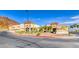 View of a tan commercial building with multiple businesses, including Subway and a pet grooming business at 729 Scottsdale St, Henderson, NV 89002