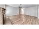 Minimalist living room showcasing hardwood floors, a fireplace and open space at 729 Scottsdale St, Henderson, NV 89002