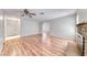Spacious living room with hardwood floors, brick fireplace, and ample natural light at 729 Scottsdale St, Henderson, NV 89002