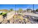 Sign for McCullough Vista Park, landscaped with native plants and desert features at 729 Scottsdale St, Henderson, NV 89002