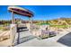 Elevated view of the park featuring educational signs about desert wildlife at 729 Scottsdale St, Henderson, NV 89002