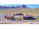 Modern school buildings with well-maintained landscaping, parking, and desert mountain views at 729 Scottsdale St, Henderson, NV 89002