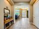 Welcoming entryway with tile flooring, archways, and a view of the dining room at 7418 Lawrence Powers Ct, Las Vegas, NV 89129