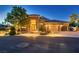 Stunning single-Gathering home with a three-car garage and illuminated landscape lighting at 7418 Lawrence Powers Ct, Las Vegas, NV 89129