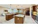 Spacious kitchen with granite countertops, island, and stainless steel appliances at 7418 Lawrence Powers Ct, Las Vegas, NV 89129
