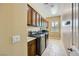 Functional laundry room with ample storage cabinets and modern washer and dryer at 7418 Lawrence Powers Ct, Las Vegas, NV 89129