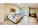 Living room has neutral decor, glass doors, and tile flooring at 7418 Lawrence Powers Ct, Las Vegas, NV 89129
