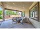 Covered patio with comfortable seating, perfect for enjoying the outdoors at 7418 Lawrence Powers Ct, Las Vegas, NV 89129